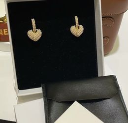 Pearl love earrings are light luxury and advanced and pearl earrings