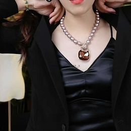 2024New pearl necklace womens collarbone chain high-end temperament socialite pendant fashionable and versatile sweater trend