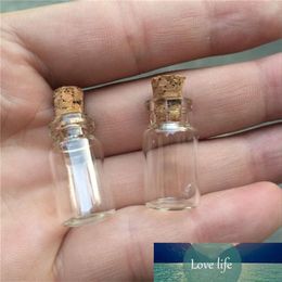 Wholesale- Wholesale 1ml Mini Glass Bottles Vials With Cork Empty Tiny Transparent Glass Bottle Jars 13 24 6mm 100pcs lot Free Shipping 209l