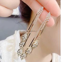 2024925 Silver New Live Gold Branches Jade Leaves Earrings Long Style Tassels Three Lives and Internet Celebrities High end