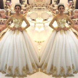 Элегантные прозрачные длинные рукава кормят линию свадебные платья арабские органза Золотой аппликация.