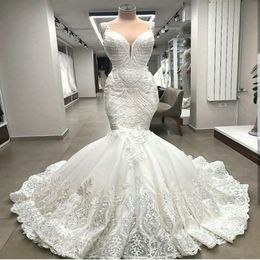 Vestidos de noiva de sereia de renda exclusivos de ponta Apliques Dubai Vestidos de noiva com miçangas de berros de mariee de mariee 306x
