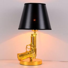 Cross-border spot gold-plated pistol table lamps hotel bedside table lights creative personality AK47 long gun value desk lights floor 295P