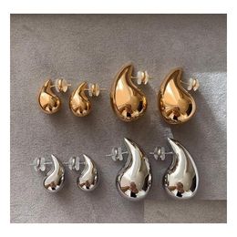 Stud Gold Colour Glossy Water Droplet Comma Earrings For Women Niche High End Cold And Light Luxury Top Quality Charm Jewellery Drop Del Dhr9G