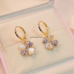 2024 New Four Leaf Grass Earrings Love Cat Eye Stone Ear Buckles Korean Edition Fashionable Exquisite and Minimalist