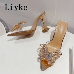 Slippers Liyke PVC transparent womens slippers fashionable rhinestone bow summer sandals dot toe transparent high heels party ball shoes T240528