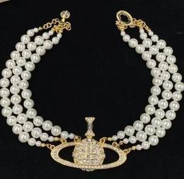 Neuer Saturn Drei -Schicht -Halskettendesigner Perlenketten Persönlichkeit Fortgeschrittener einzigartiger klassischer klassischer Zierschmuck Hochzeitsgeschenk
