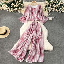 European oversized loose and slimming holiday set for womens heavy industry pleated chiffon shirts short and versatile wide leg pants two-piece set