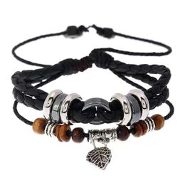 20pcs/Lot Europe e gli Stati Uniti Personalità popolare Creativa creativa foglie intrecciate a sospensione Gli amanti dei ciondoli in pelle Bracciale Gioielli all'ingrosso