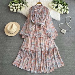 Gentle and ladylike temperament long sleeved stand up collar with ruffled edges slim waist medium length A-line printed pleated dress