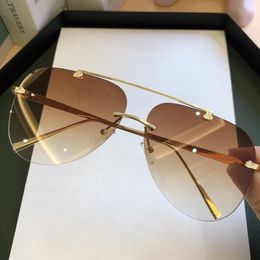 Güneş Gözlüğü Vintage Rimless Alaşım Havacılık Pilotu Erkekler için 2023 Gradyan Güneş Gözlükleri Kadın Metal Oval Tonlar Siyah Brownsunglasses 2298