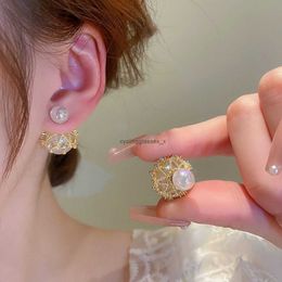 2024 S925 Mermaid Princess Pearl Earrings are popular on the internet featuring light luxury pearls and a silver needle earring worn in front back 14I4H