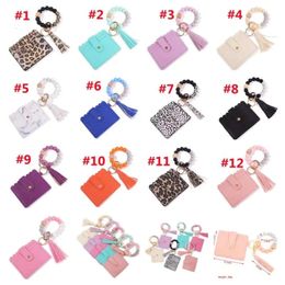 US Stock Fashion PU Leather Bracelet Wallet Keychain Party Favour Tassels Bangle Key Ring Holder Card Bag Silicone Beaded Wristlet Keychains Handbag Fy3399 Xu