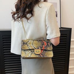 Factory outlet womens shoulder bag 4 Colour niche design Colour matching leather handbag sweet lady snake chain bag this year popular contrast fashion backpack 1299#