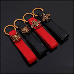 Key Rings New Brand Keychains Genuine Leather Keyrings For Car Keys Women Men Bee Fox Design Bag Charms Pendants Man Chain Fobs Drop Dh6Ps