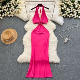 Womens clothing design with hollow out waist and sexy backpack hip skirt with deep V-neck and hanging neck dress for women in summer