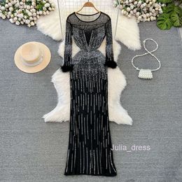 Spring and Autumn Fashionable Sexy Long sleeved Round Neck Waist Slimming Mid length Mesh Hot Diamond Perspective Wrapped Hip Dress