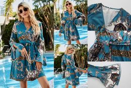 Bohemisk stil strand solskydd v-hals kort kjol elegant och bantning blommig tryck flare hylsor klänning ast2610885