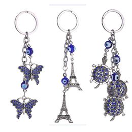Key Rings Blue Evil Eye Keychain Ring Jewellery Tortoise Eiffel Tower Keyring Fashion Animals Butterfly Charms Chain Holder For Handbag Dhjly