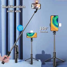 Selfie Monopods FANGTUOSI 2024 new wireless selfie stick tripod Bluetooth foldable monopod with LED light remote control shutter suitable for wholesale iPho