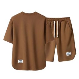 Mens Korean Fashion Two Piece Set Summer Short Sleeved Tshirt And Shorts Loose Sets Men Designer Clothes Tracksuits 240530