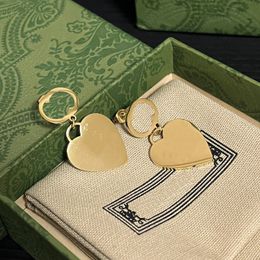 Luxury 18k Gold-plated Earrings Brand Designer Heart-shaped Pendant Design Minimalist Style Earrings Temperament Charm Womens Luxury Earrings