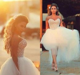 Corset Top Wedding Dresses 2019 Beaded Pearls high low Tulle Summer Beach Country Bridal Gowns Saudi Arabic Luxury Modest3049249