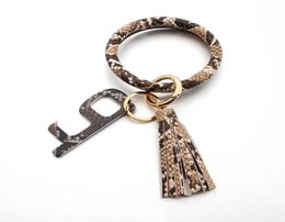 Portable American Flag PU Tassel bracelet Leopard Alloy Open Elevator Door Buckle Anti Contact Chains Safety Touch Keychain GGB3815256410