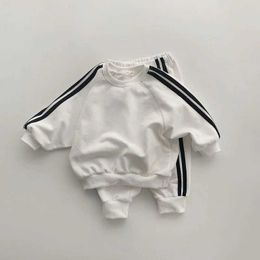 Family Matching Outfits Boys and girls spring new 2023 childrens cool letter printing zipper top pants leisure sports two piece baby suit H240530