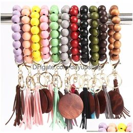 Keychains & Lanyards 11 Colours Wooden Bracelet Keychain With Tassels Keys Diy Wood Fibre Pandent Woodwooden Bead Bangle Key Decorate Dheya