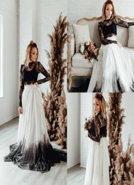 2020 Vintage Black Wedding Dresses Jewel Neck Lace Appliqued Tulle A Line Long Sleeves Gothic Wedding Gowns Beach Style Abiti Da S7348248