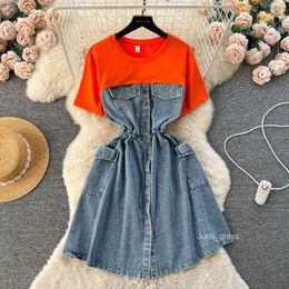 Large size womens clothing design with a fake two piece short sleeved t-shirt contrasting color patchwork large pockets denim dress womens trend