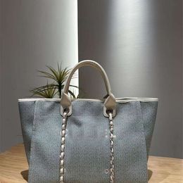 Дизайнерская сумка тота 2024 модные высококлассные малые ароматные стиль женские сумки для плеча модные и простые пляжные портативные GBLK