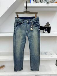 Pantaloni versatili di nuovi pantaloni lunghi da uomo pantaloni di denim casual e confortevole