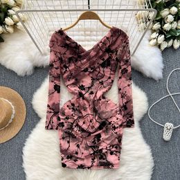 Light mature style womens clothing design with a cross V-neck elastic slim fit short and sexy buttocks wrapped skirt printed dress
