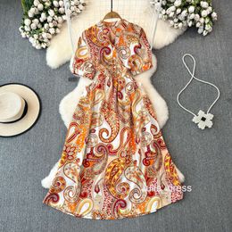 Light mature style socialite temperament short sleeved stand up collar waist length A-line printed dress seaside vacation beach skirt