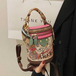 Handbag Clearance Retail Wholesale 95% Off Beach bag Advanced Womens Network Red luxury Little Bear Graffiti Bucket Personalized Shoulder Trend Versatile Handbag