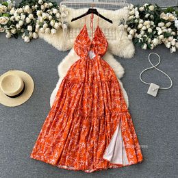 French backless floral camisole dress for women in summer with a slim waist and a super fairy split style for vacation. Long skirt