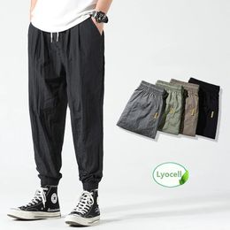 UNVANQU 2024 Summer Pants Mens Stretch Korean Casual Ice Silk Slim Fit Elastic Waist Lyocell Classic Trousers Male Black Grey 240326