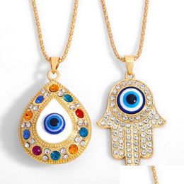 Pendant Necklaces In Bk Alloy Rhinestone Fatima Hand Pendant Necklace Turkish Blue Evil Eyes Diamond Set Sweater Chain Necklaces Jewel Dhb54