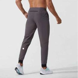2024 lululemenI Men Pants Yoga Outfit Sport Quick Dry Drawstring Gym Pockets Sweatpants Trousers Mens Casual Elastic Waist Advanced Design super668