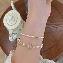 Vans Japanese and Korean Instagram Elegant and Elegant Four Leaf Grass Pearl Bracelet Womens Korean Edition Simple and Versatile Girlfriend Student Handicraft