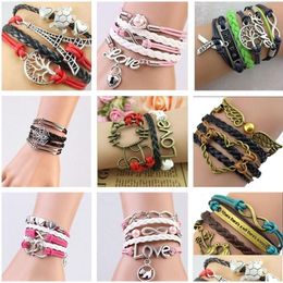 Charm Bracelets 2022 New Mix Styles Charms Jewelry Infinity Bracelet For Women And Men Cross Owl Love Bird Believe Drop Delivery Dho7R