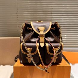 Designer Women Backpack 24 Resort Collection top Quality Leather Multi Pocket Backpack Chain Decoration Fashion Duma Women knapsack 240315