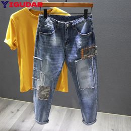 Autumn fashion handsome personality retro patchwork jeans mens old patch holes Ripped jeans pants cargo pantalones hombre 240318