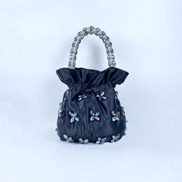 Handwoven acrylic beaded bag, fairy handbag, triangle wrist bag, trendy and fashionable women's bag 240402