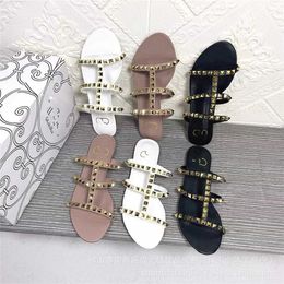 18% OFF Designer shoes External Beach Vacation Fashion French Flat Roman Female Rivet Slippers Summer Outwear