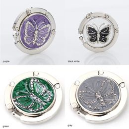 2024 Round Metal Hanger Holder Unique Folding Portable Butterfly Pattern Fashion Portable Table Hook Alloy Purse Handbag Bag Sure, here are