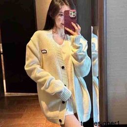 Designer High quality MIU sweater, college style V-neck cardigan, solid color knitted sweater jacket, Miao women's clothing for autumn and winter WXK4