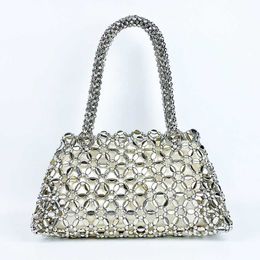 Korean version Personalised woven hollow high aesthetic ceiling versatile handbag with shiny handmade pearl tote underarm bag 240402